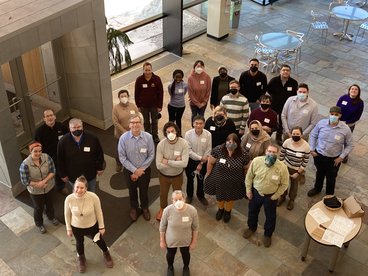 Group photo of all attendees of the Bacterial Leaf Streak meeting in the main lobby of the Cargill Building, UMN